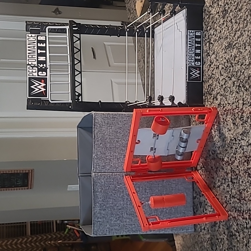 WWE Wrekkin' performance center, with huge lot of figures.